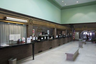 Bank interior teller wall from front looking toward rear