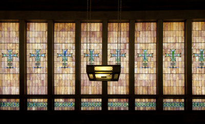 Bank wall with stained glass windows and stained glass lamp