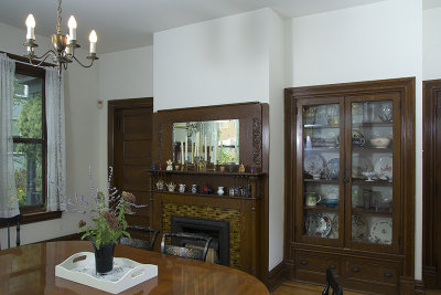 Diningroom: fireplace wall and windows