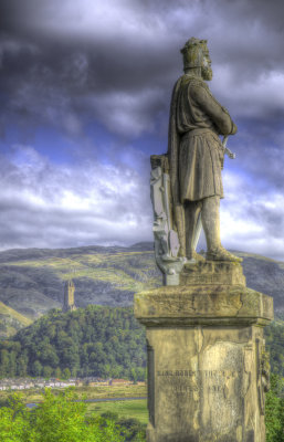 King Robert the Bruce looking east with the Wallace monument in the background at Stirling