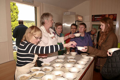 Serving the Porridge to the audience