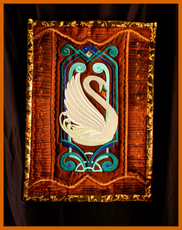 Art deco swan embroidery on silk shot in natural light,.jpg