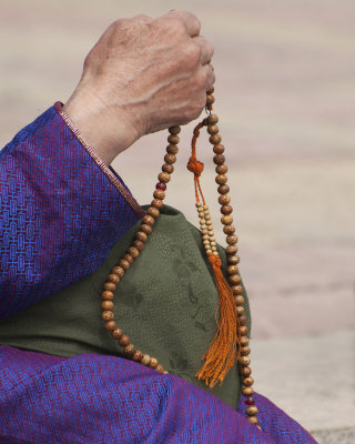 Praying Hands and Beads