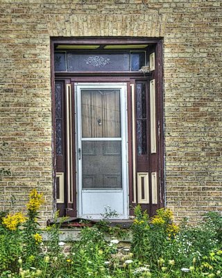 Abandoned Yellow House Door