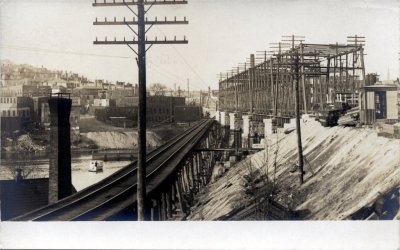 Temporary bridge during grade elimination and elevation of bridge