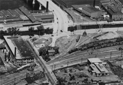 1928 aerial view of Parker St crossing, Merrimack St and future site of B&M station