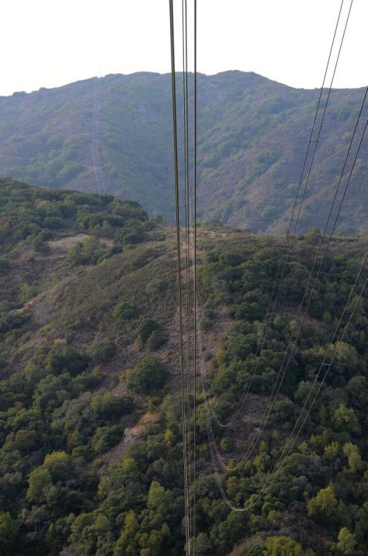 power cables gliding right above the ridges