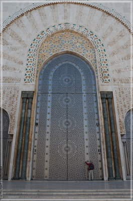 A massive entryway door, with very detailed patterns