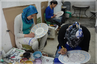 painting before firing the pottery