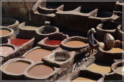 colorful vats hold the dye used to tan leather