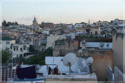 A very old city, with satellite dishes on the rooftops