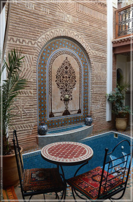 Mosaic decorated courtyard and table