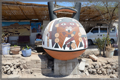 A pottery is near by.  The image represents puma - the animal of  the living world