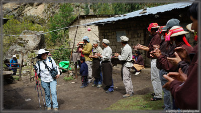 Guide and porters line up at lunch spot to congratulate us on a successful morning hike.