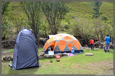 Our dining tent and portable toilet