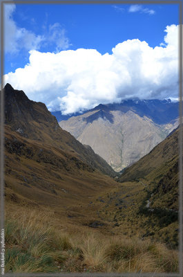 The trail is cut into the side of the hills