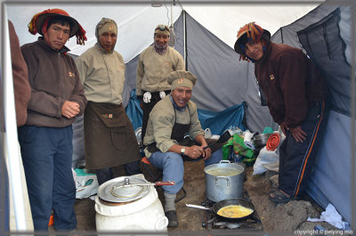 The kitchen tent where an omelet is prepared