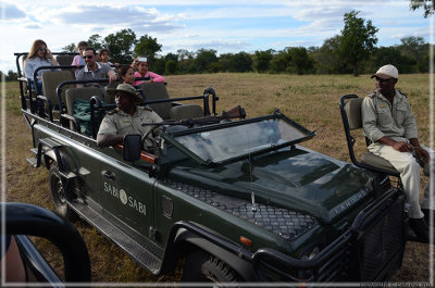 Typical Landrover vehicle: a tracker sitting in the front, driver is the ranger