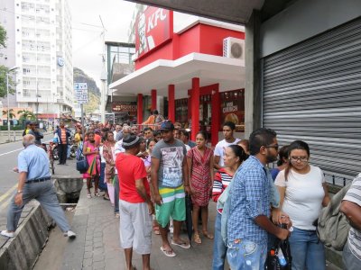 Port Louis part of a queue about 200 metres long