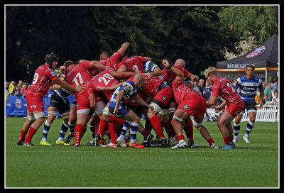 A scrum becomes a hard fought battle between the teams
