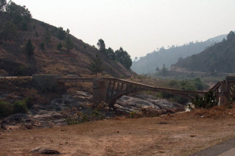 Collapsed road bridge