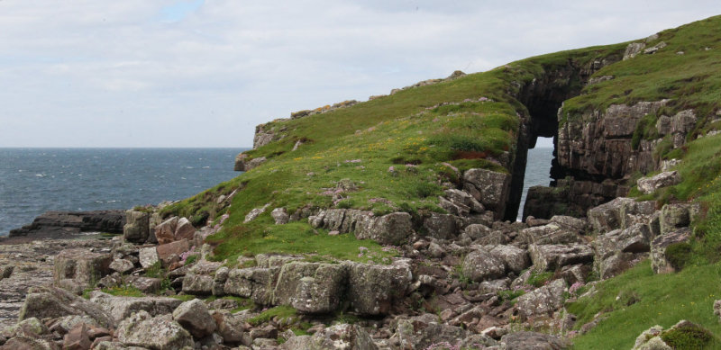 Sea cave arch on Handa Island looking south
