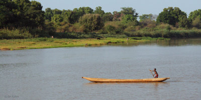 A boy in a boat on the River Manambolo