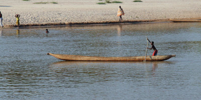 A boy in a boat on the River Manambolo