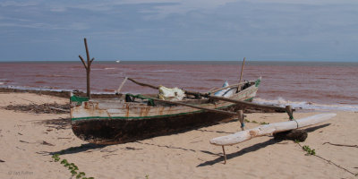Boat and outrigger on the beach at Katsepy
