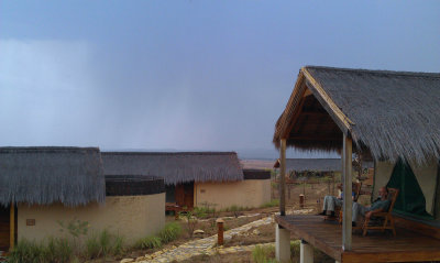 Oz and Gail relaxing, storm approaching, Satrana Lodge Hotel