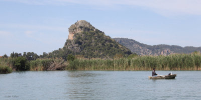 The Kaunos Rock from the river in Dalyan