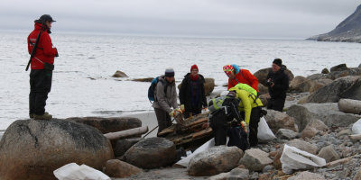 Beach cleaners in action, Danskya, Svalbard