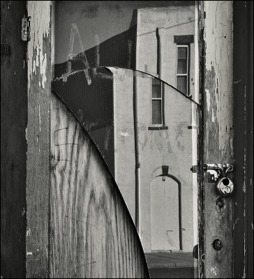 Battered Mirrored Door