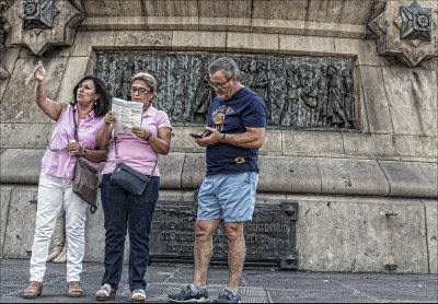  Tourists ...Sightseer,  Brochure Reader, and Cell Phone User