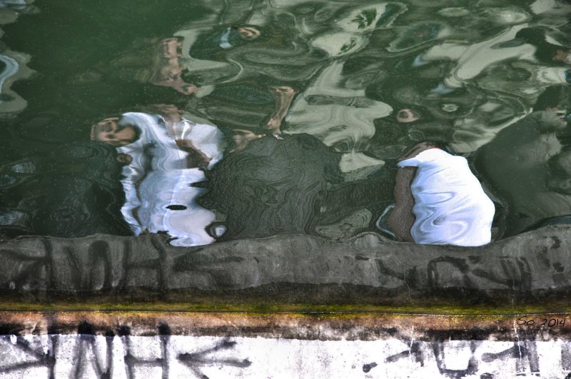 Faces by the waterbank