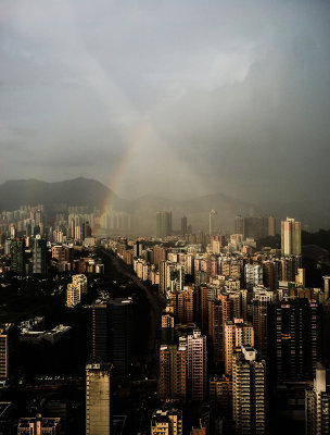 play of light above Kowloon during an afternoon  rain
