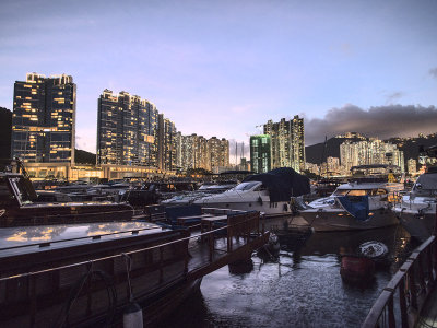 the Typhoon Shelter lights up as evening falls, Hong Kong Island