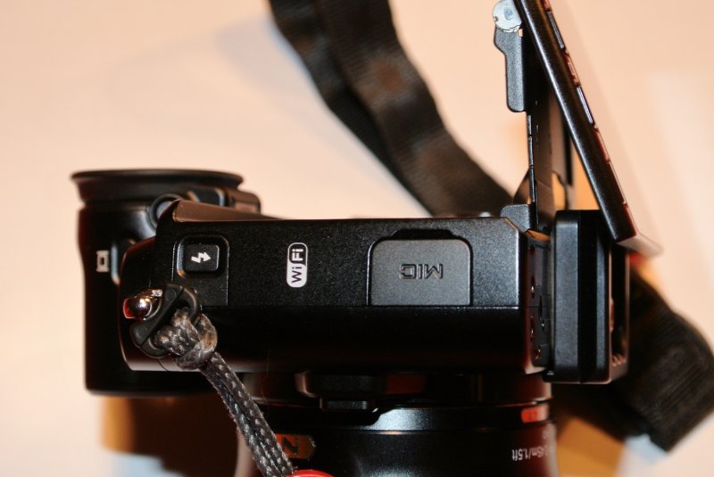 Nikon 1 V3 with PZ-130 mounted