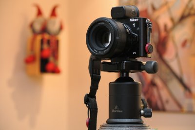 Nikon 1 V3 with PZ-130 mounted