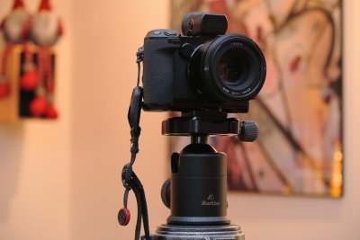 Nikon 1 V3 with grip and PZ-130 mounted