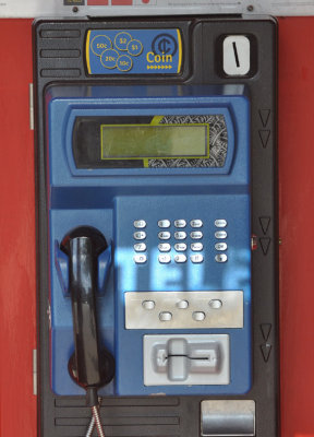 Phone box white Coins. ( Queenstown NZ )