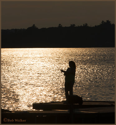 Fishing Off The Dock At Sunset 