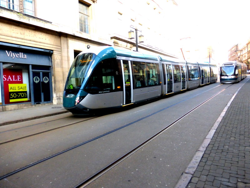 233 (2016) Alstom Citadis 302 @ Old Market Square, Leaving