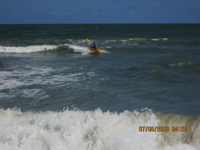 Joe riding a wave