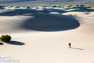 A photographer at sand dunes