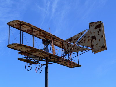 Rusty airport airplane sculpture in the sky