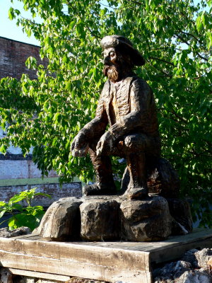 Wooden Statue of Early Miner