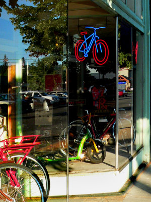 Bike Store Window Reflections closeup