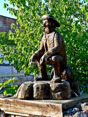 Wooden Statue of Early Miner