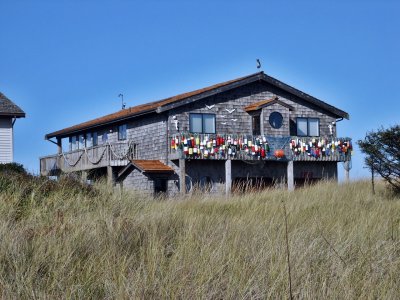 Beach house seen through beach grass